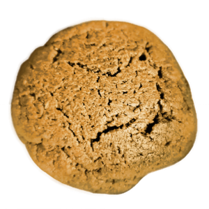 کوکی شکر سرخ ارگانیک، شکل تقریبا دایره ای، کمی ترد و دارای ترک های کوچک روی آن